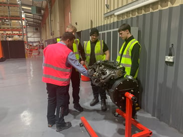 apprentices learning on the job at toyota