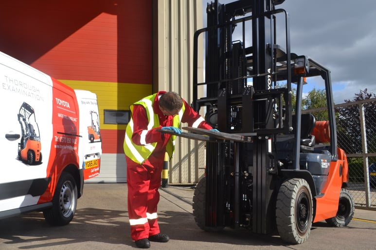 examining forklift