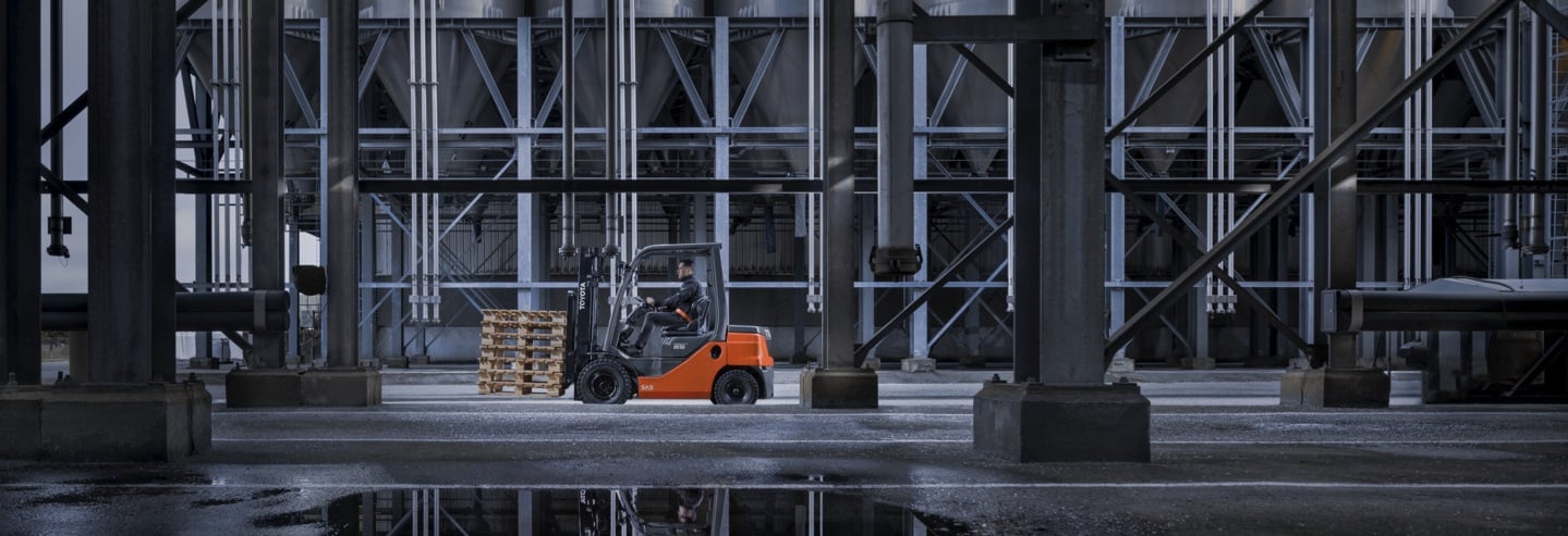 Diesel powered forklift truck carrying pallets