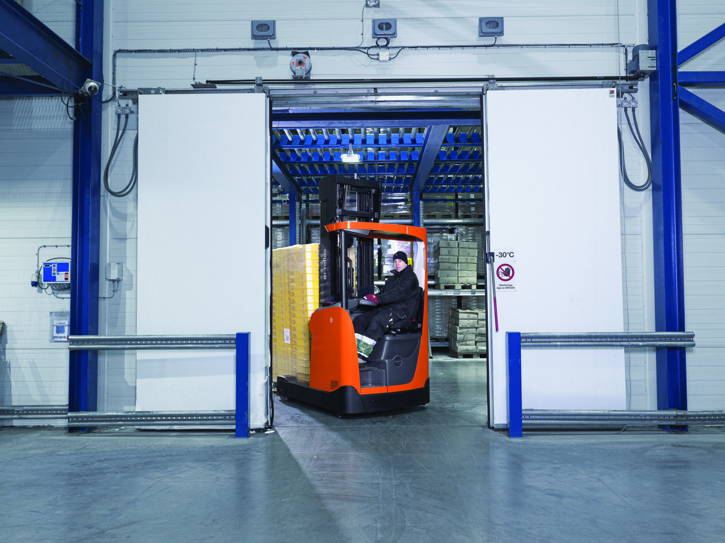 toyota reach truck with operator in cabin